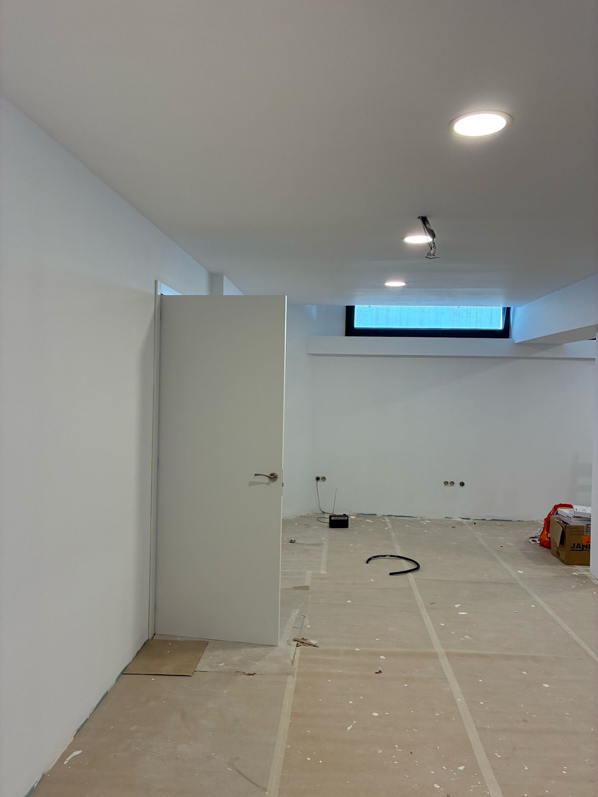 Salón reformado con pladur y acabado liso