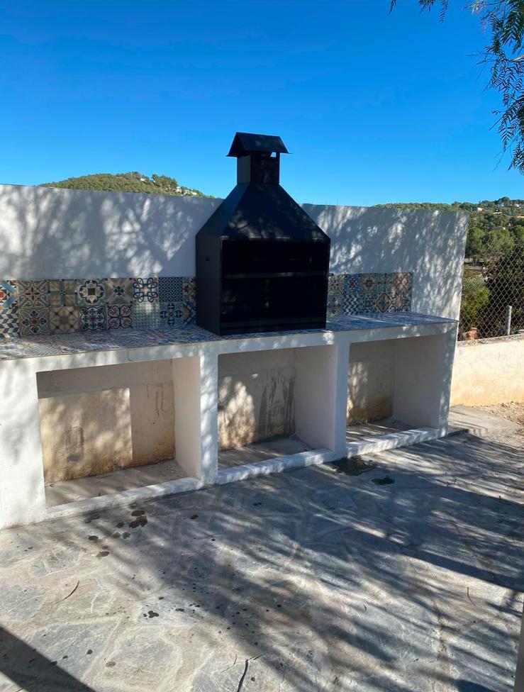 Instalación de barbacoa metálica Instalación de la barbacoa metálica